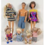 A collection of modern Barbie dolls to include Ken, Skipper and Chelsea.