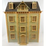 A Regency style 1:12 scale dolls house and contents. Windows to font and sides of house. Front of