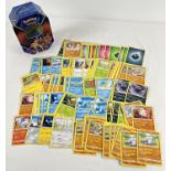 200 assorted PokÃ©mon cards in a Galar Legend Zacian PokÃ©mon V trading card game tin.