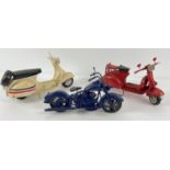 3 modern painted tin plate vehicles. A cream scooter, a red scooter and a blue vintage style