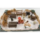 A collection of 1:12 scale dolls house garden furniture and accessories to include: dustbins,