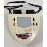 A vintage 1980's Tomytronic 3D handheld electronic game "Thundering Turbo". Complete with neck