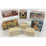 A collection of small wooden trinket and storage boxes decorated with DC, Marvel and Thunderbird