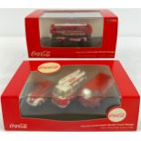 2 boxed collectors die cast Coca Cola advertising vehicles. A Routemaster London United double