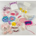A collection of vintage My Little Pony clothes and accessories. To include reins and saddles, double