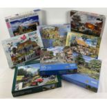 8 boxed 500 & 1000 piece jigsaw puzzles, to include Ravensburger, Falcon & Corner Piece puzzles.