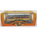 A boxed CC42418 The Beatles Magical Mystery Tour Bus by Hornby Hobbies, Corgi.