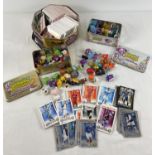 A tin of assorted Topps Match Attax Premier League football trading cards. Together with 2 tins of