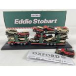 A boxed 1:76 scale diecast Eddie Stobart Scania EVO 6 Car Transporter 76SCT005. Complete with