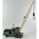 A green and cream vintage tin plate 6 wheel Marx and Co "Lumar Contractors" High Lift Mobile crane
