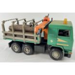 A 1:16 scale green loader lorry with crane, open back and logs, by Bruder. Moving parts throughout.