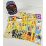 200 assorted PokÃ©mon cards in a Galar Legend Zamazenta PokÃ©mon V trading card game tin.