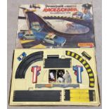 A vintage 1980's Matchbox Powertrack Race & Chase battery operated car racing set. One car