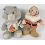 A vintage 1983 Kenner Toys Care Bear plush toy of Grams, complete with shawl. Together with a