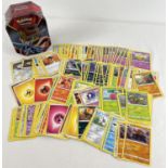 200 assorted PokÃ©mon cards in a Galar Legend Zamazenta PokÃ©mon V trading card game tin.