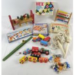 A box of assorted vintage toys and games. To include boxed The Magic Roundabout xylophone, Brio