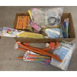A large box of assorted new toys to include bubble wands, fairy wings, kites, pop-up books,