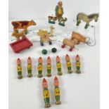 A collection of vintage wooden toys to include Chad Valley pull-along farmer and animals.