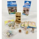 A collection of Flair Toys Sylvanian Families animal babies figures and accessories, some with