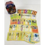 200 assorted PokÃ©mon cards in a Galar Legend Zacian PokÃ©mon V trading card game tin.