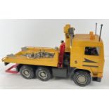 A 1:16 scale F16 Intercooler 6 wheeled open back lorry with crane and cage. In yellow hard