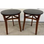 2 vintage tripod legged occasional/pub tables with black high polish circular wooden tops. Shaped