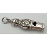 A 925 silver whistle with floral decoration and hanging bale. Approx. 6cm long.