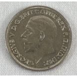A George V 1932 uncirculated and lustred sixpence coin.