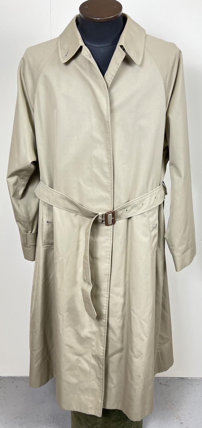 A beige belted long trench coat by Burberrys. Classic check full length lining, button front - Image 2 of 9