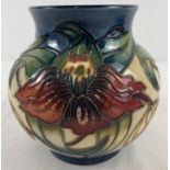 A Moorcroft Anna Lily design vase of bulbous form, stamped and signed to underside. Design by Nicola