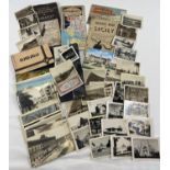 A collection of assorted WWII era photographs, postcards and ephemera. To include photographs of