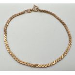 A 9ct gold 7.5" serpent chain bracelet with spring ring clasp. Gold marks to clasp and fixings,