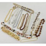 A collection of neutral, gold and silver tone bead necklaces and earrings. To include natural