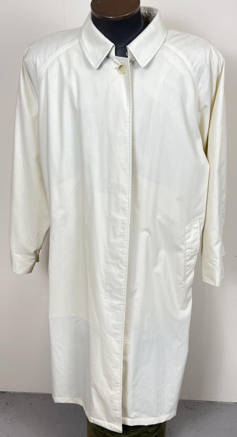 A cream light weight belted trench coat by Burberrys. Front button fastening with 2 front pockets. - Image 2 of 6