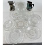 A collection of 9 moulded glass coronation plates together with 2 antique ceramic jugs.