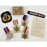 WWII medal group of 4 medals together with 2 period cloth badges. Medals comprise: 1939-45 War