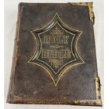 A large Victorian Leather & brass bound family bible with full sized coloured plates by Cassell &