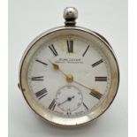 A vintage silver pocket watch by "Acme Lever" H. Samuel, Manchester. Enamel face with gold tone