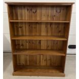 A modern pine open fronted bookcase with 3 adjustable shelves and tongue & groove panelled back.