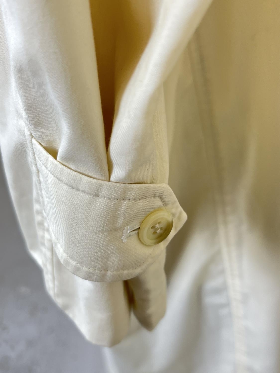 A cream light weight belted trench coat by Burberrys. Front button fastening with 2 front pockets. - Image 3 of 6