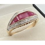 A 9ct gold Art Deco design diamond and ruby set dress ring by Luke Stockley, London. Central