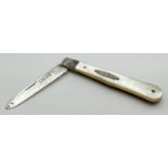 A small antique pearl handled silver fruit knife with empty cartouche. Hallmarked for Sheffield
