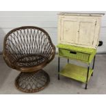 3 vintage items of furniture. A mid century cane peacock style chair; a metal framed cane cabinet