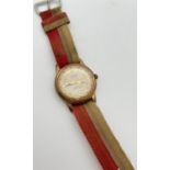 A men's vintage automatic wristwatch by Allaine. Goldtone case, hours markers and hands. With