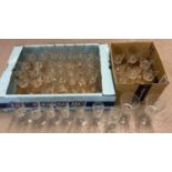 2 boxes containing a large quantity of matching French crystal stemmed glasses, by Luminarc. Some