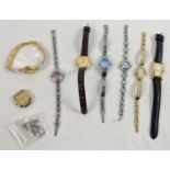 A collection of ladies modern quartz dress watches to include stone set bracelet straps. With a