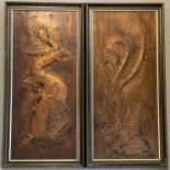 2 framed repousse copper panels. One depicting an oriental phoenix the other a dragon. Both with