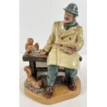 Royal Doulton ceramic figurine "Lunchtime" HN2485, of a man seated at a park bench feeding