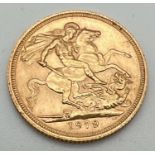 An Elizabeth II 1975 22ct gold full sovereign coin.
