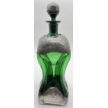 An Art Nouveau Holmegaard glass Kluk Kluk decanter with pewter overlay. Attributed to Jacob Bang,